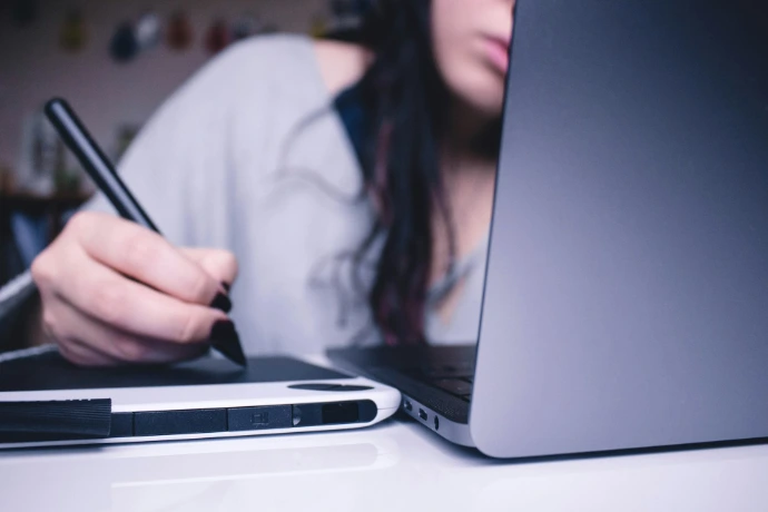 Professional completing cloud security training on a laptop